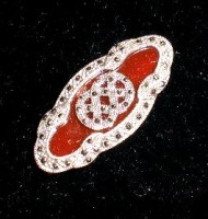 Marcasite brooch with red piece